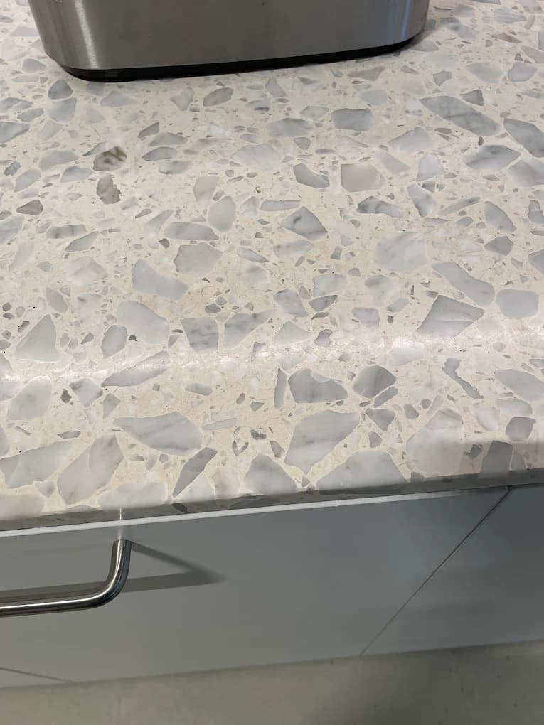 A finished stone benchtop, photographed for a customer review.